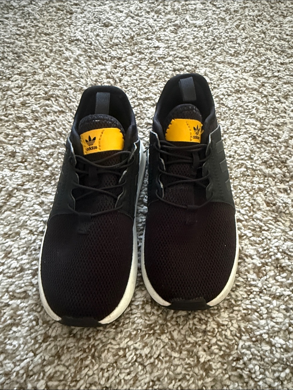 adidas Kids Black Sneakers with Yellow Tongue Accents
